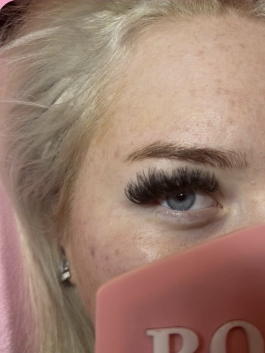 Wispy lash set on a client with blue eyes